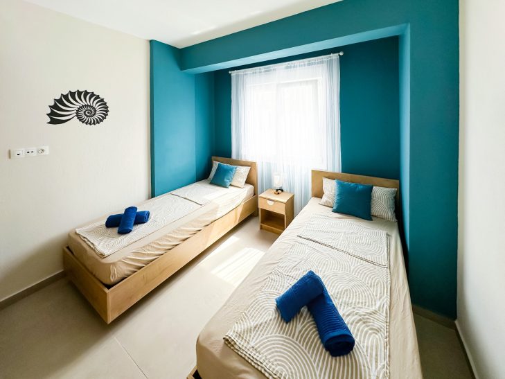 Bedroom Nautilus Bedroom at Thálassa Blu Family Maisonette in Nikiti Chalkidiki Greece modern and comfortable holiday accommodation