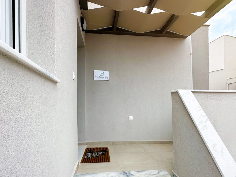 The Entrance Welcoming entrance to a modern family-friendly maisonette in Nikiti, Chalkidiki, Greece, offering a comfortable and relaxing holiday stay