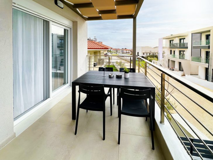 Sea View Terrace First Floor Sea view terrace at Thálassa Blu Family Maisonette in Nikiti Chalkidiki Greece outdoor seating with panoramic Aegean Sea views